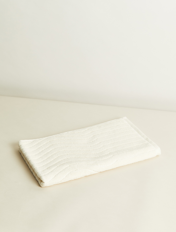 baina-eyre-organic-bath-mat-ivory-product-folded