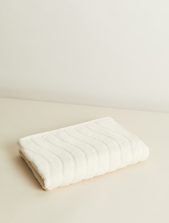 baina-st-clair-organic-bath-towel-ivory-product-folded