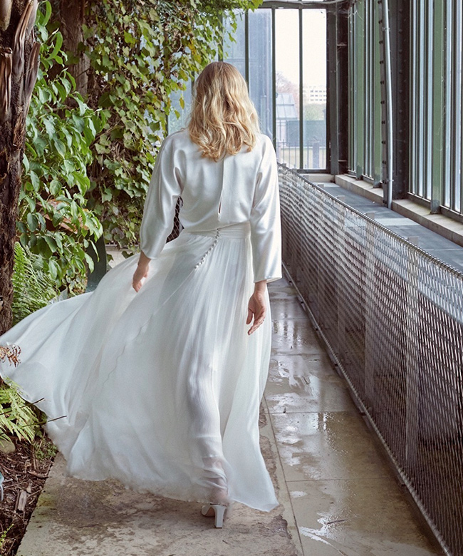 olistic-the-label-caelum-skirt-organic-peace-silk-white-photograph-model-walking-away