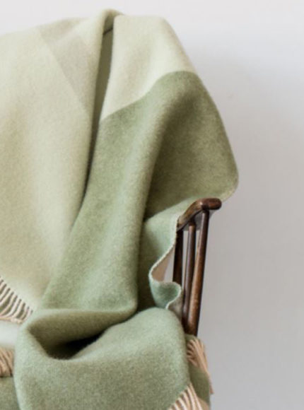 forestry-wool-blanket-meadow-product-image-blanket-draped-over-chair