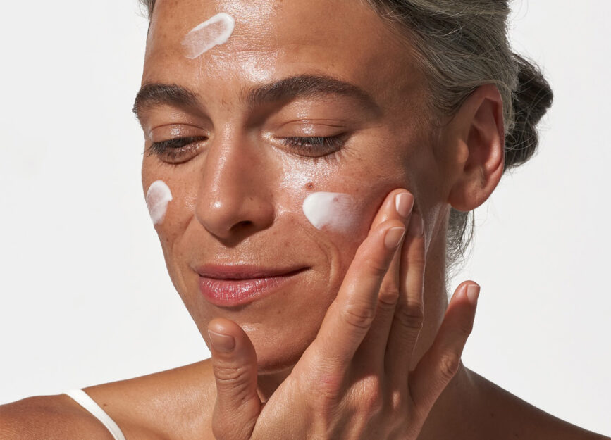 Women applying the best organic skincare products