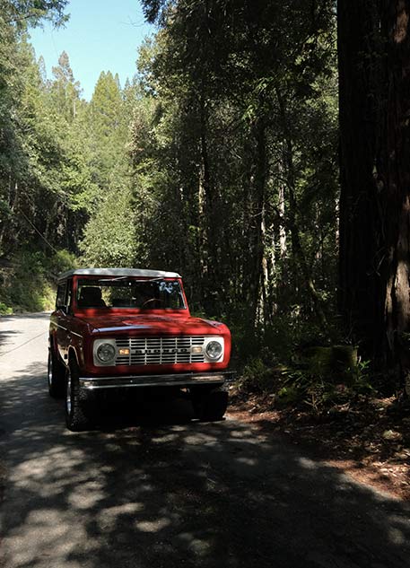 A fully restored retro bronco on a California road trip