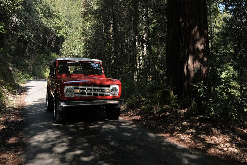 A fully restored retro bronco on a California road trip