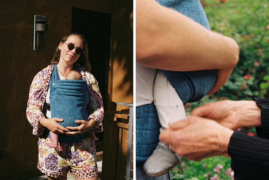Mother wearing sling as part of the baby essentials and newborn must haves editorial