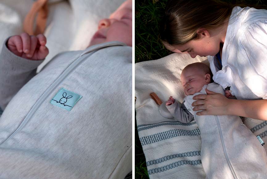 Mother comforting her baby in an ergoPouch sleep sack