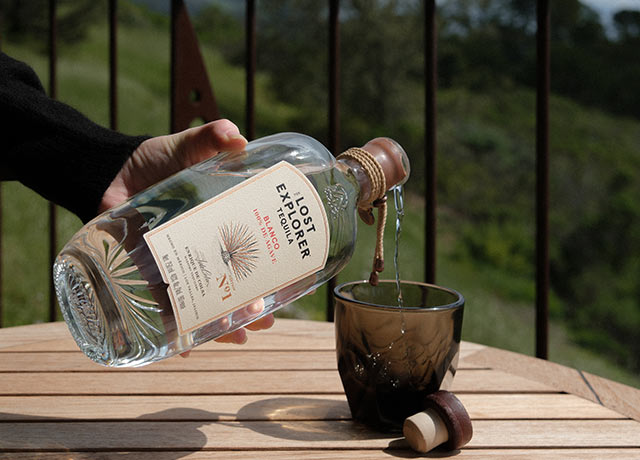 Cora Hilts pouring organic tequila by The Lost Explorer