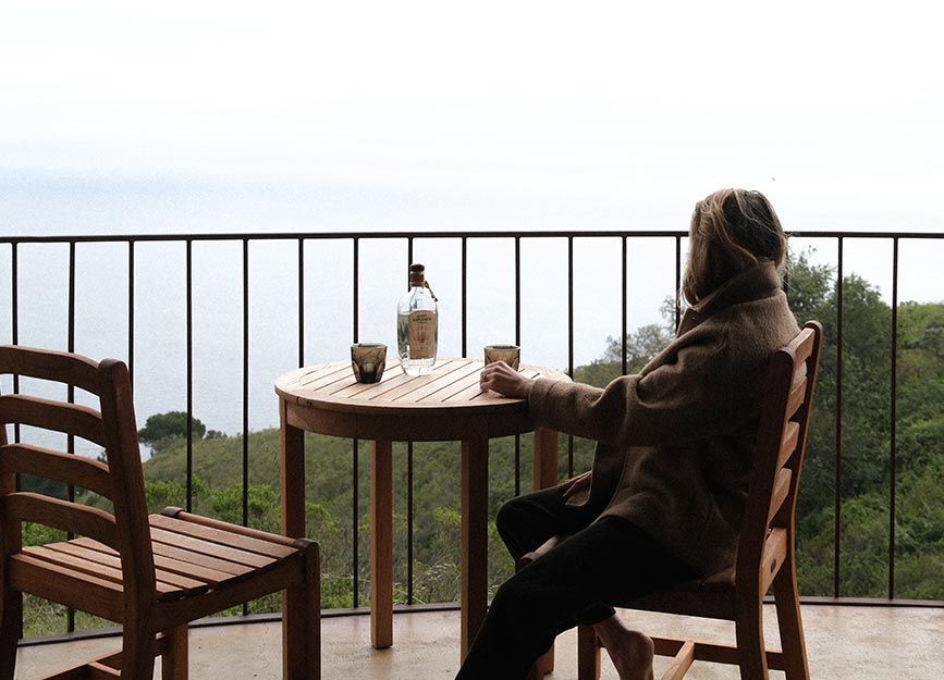 Cora Hilts drinking organic tequila by The Lost Explorer