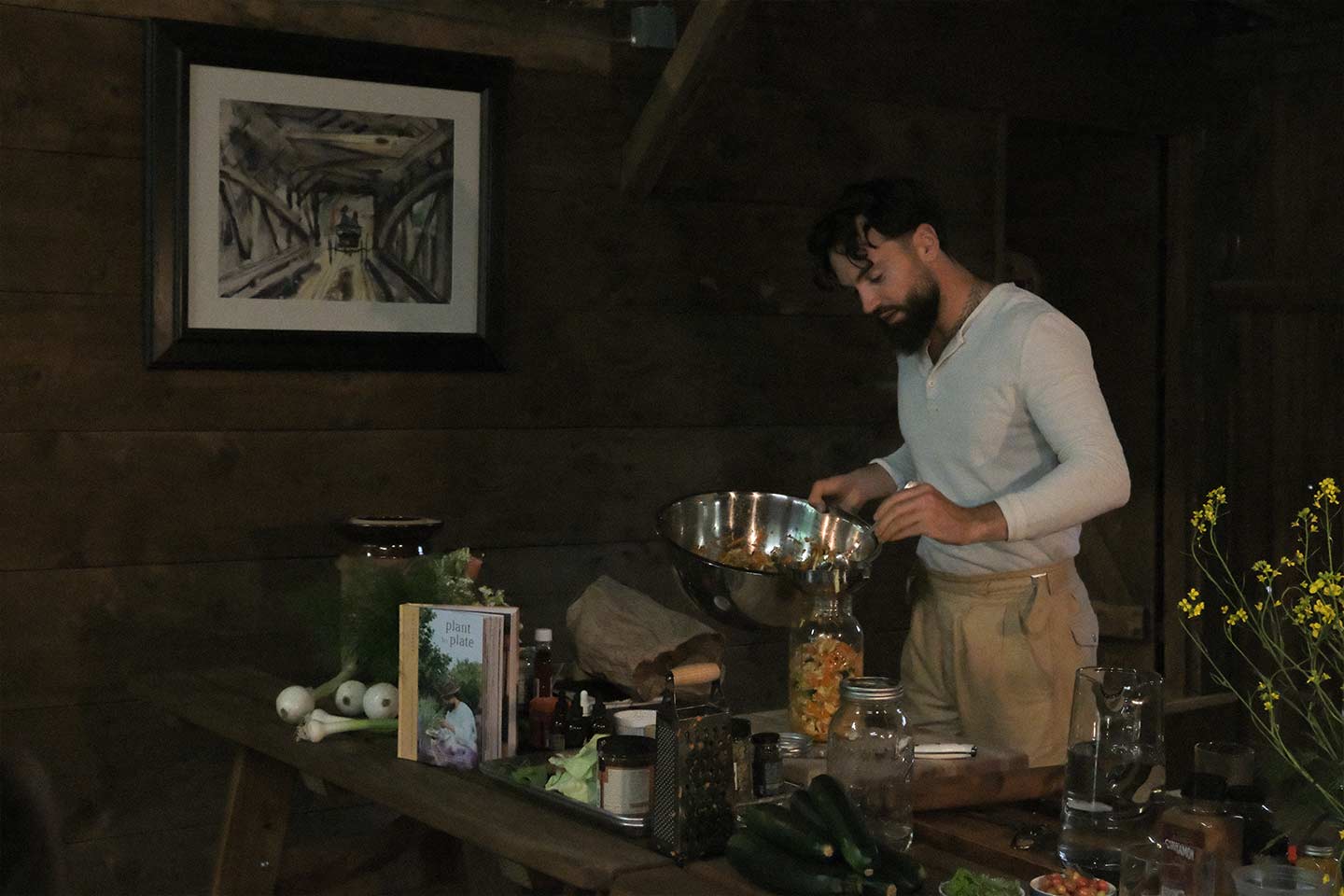 Gaz Oakley putting vegetables in a bowl