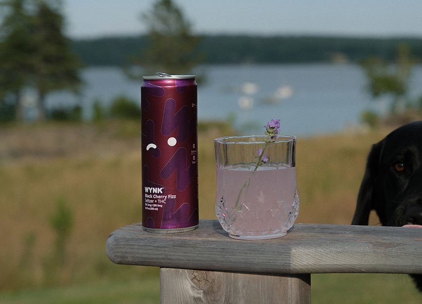 Can of WYNK drink on a patio in Maine