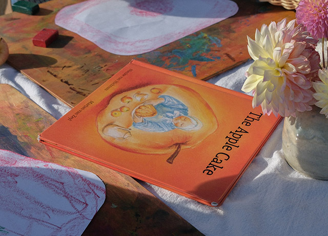 Children's book lying on a table outside
