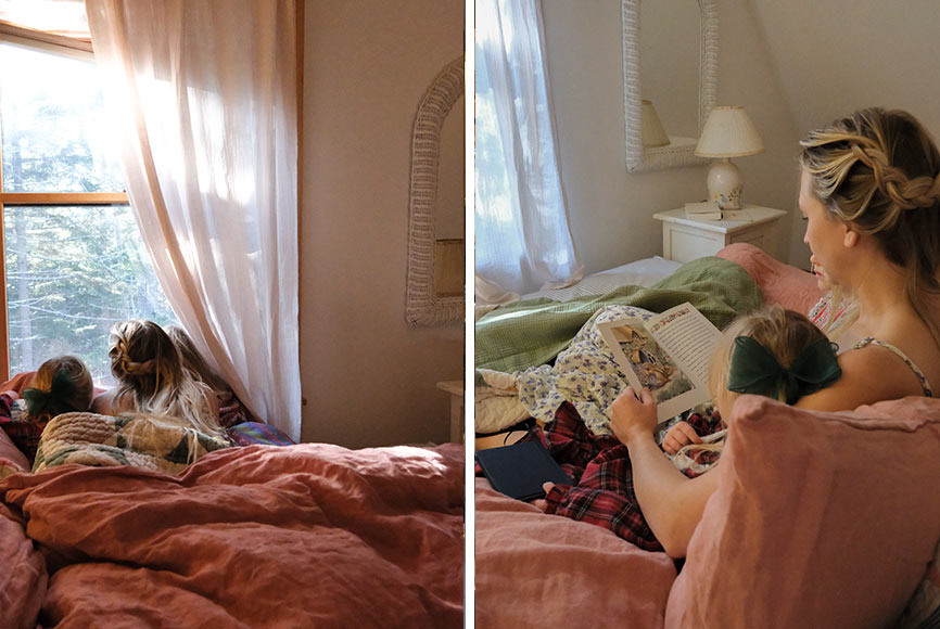 A mom in bed with her children in pink sheets