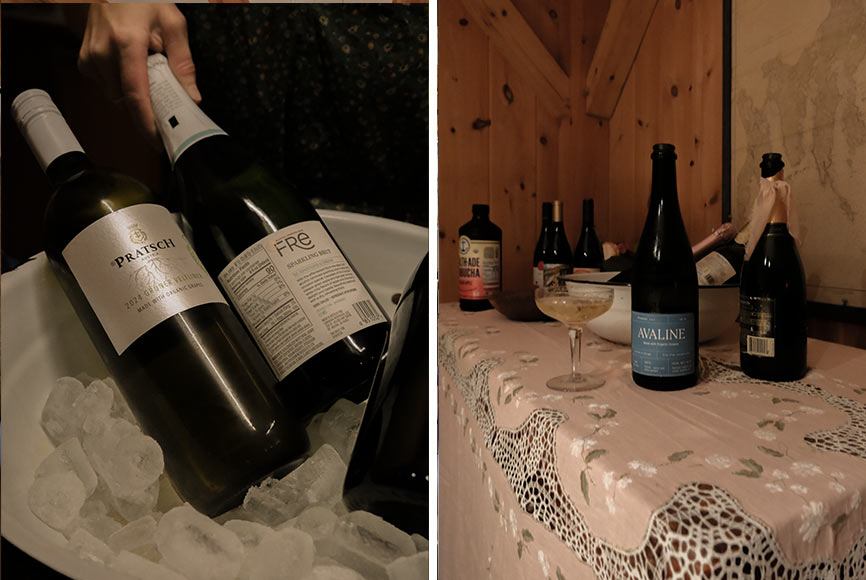 Bottles of wine going into an ice bucket