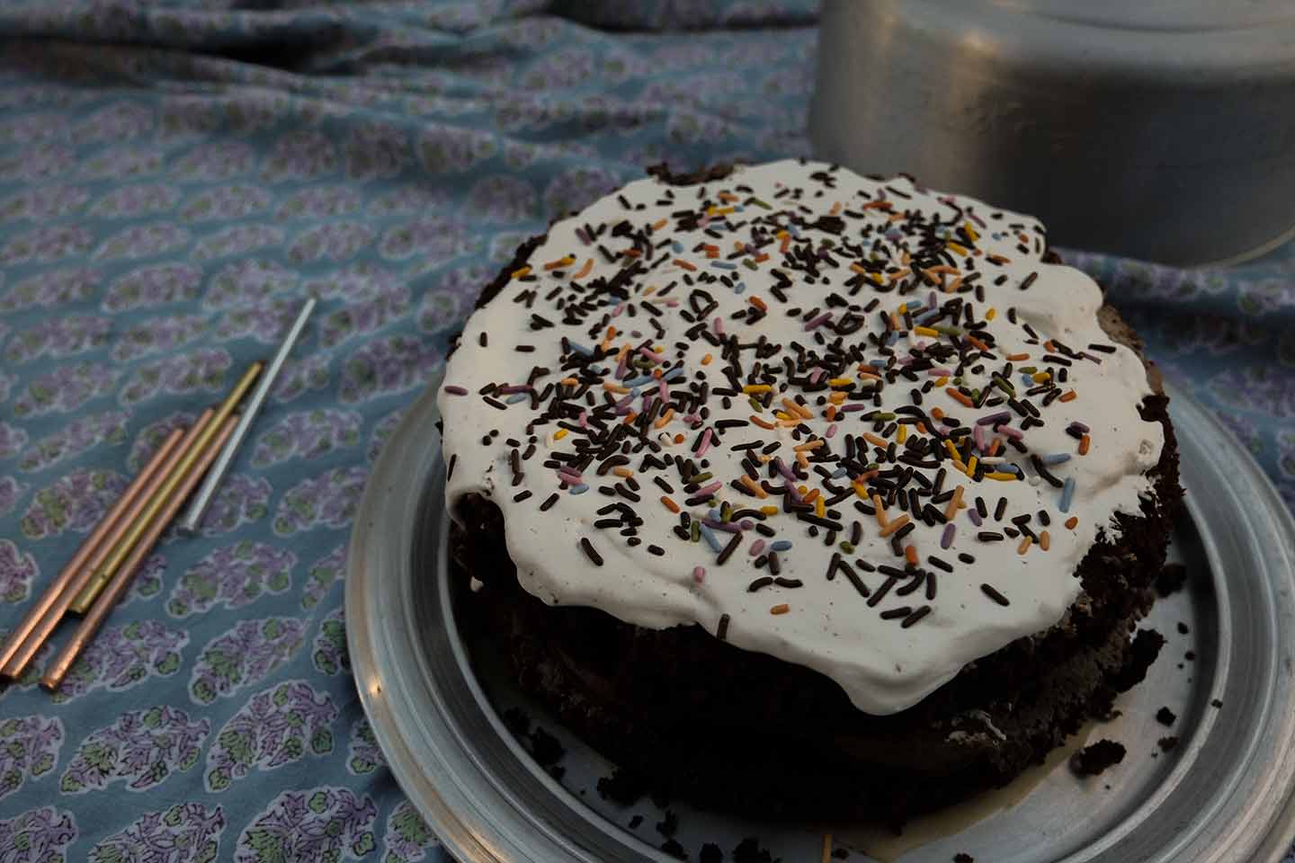 A homemade chocolate birthday cake with sprinkles on top