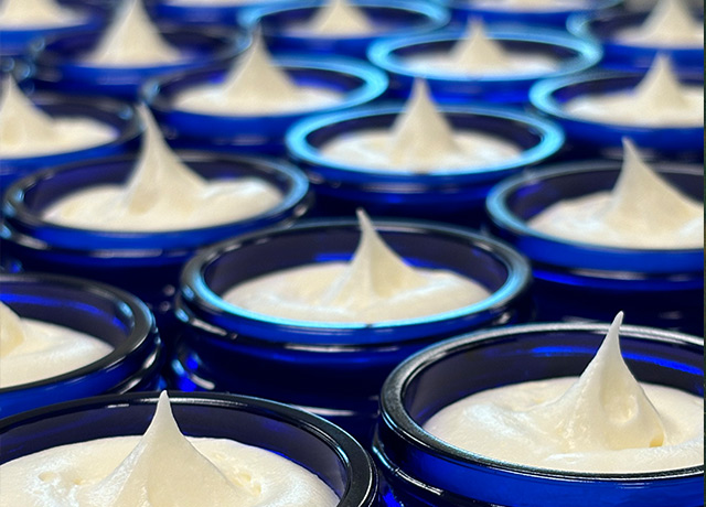 Blue jars of fresh tallow