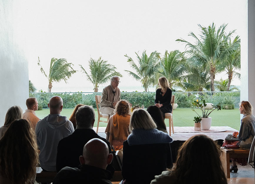 Dan Buettner speaks to an audience in Miami