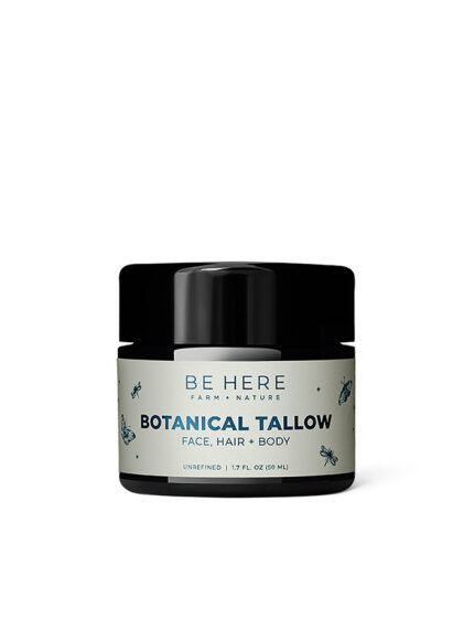 A white jar of tallow for face and body with plants on it