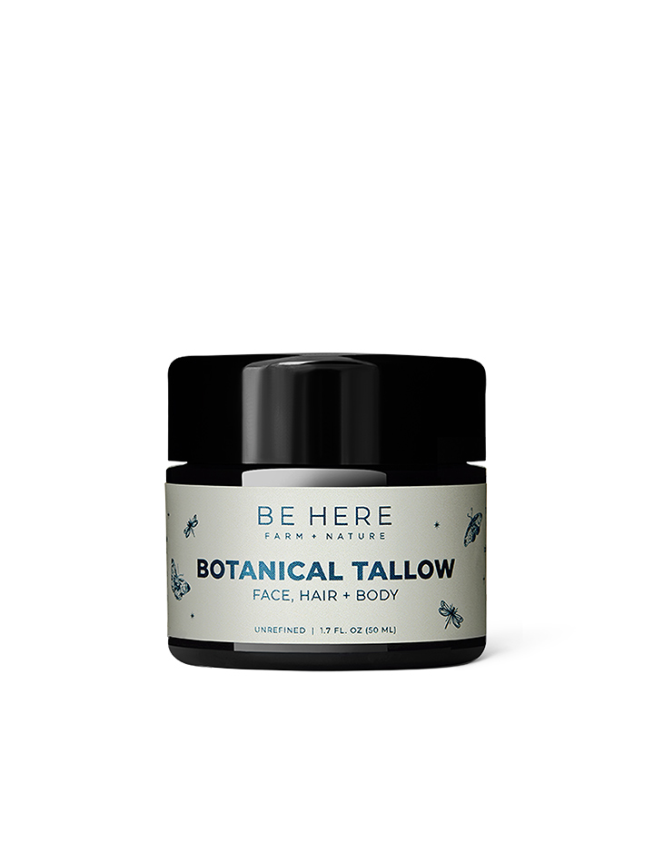 A white jar of tallow for face and body with plants on it