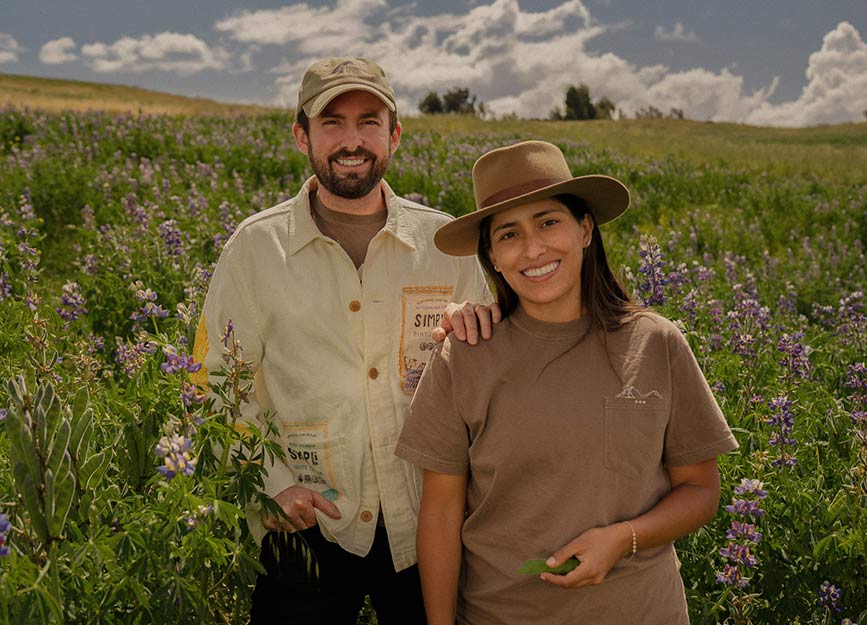 Simpli pantry staples co-founder Sarela and Matt in a field in Peru