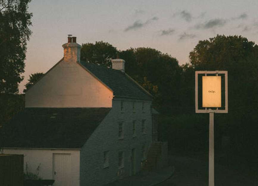 A shot of the exterior of Osip restaurant in the evening light